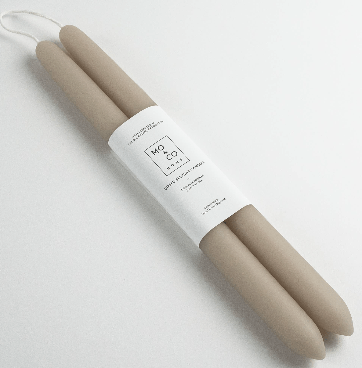 DIPPED BEESWAX TAPER CANDLE 10" product image highlighting color, material, and overall design