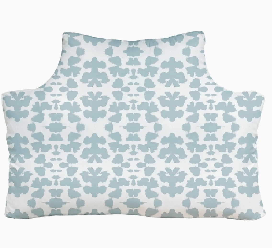 Headboard pillow by laura park in the color blue.