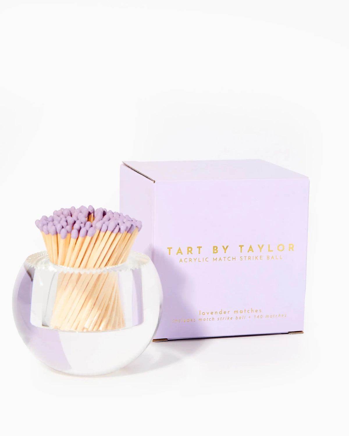 Match Holder with Striker next to its lavender box on a white background