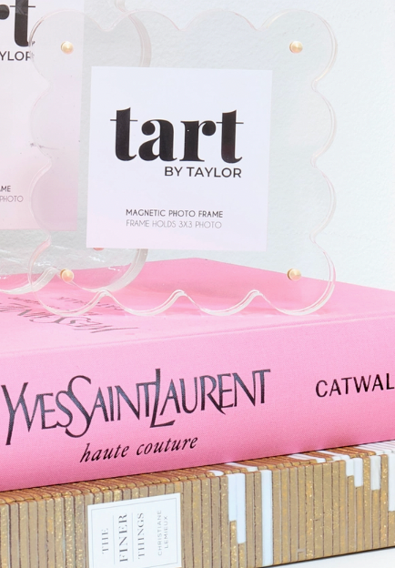 Tart by Taylor magnetic photo frame on a pink Yves Saint Laurent box