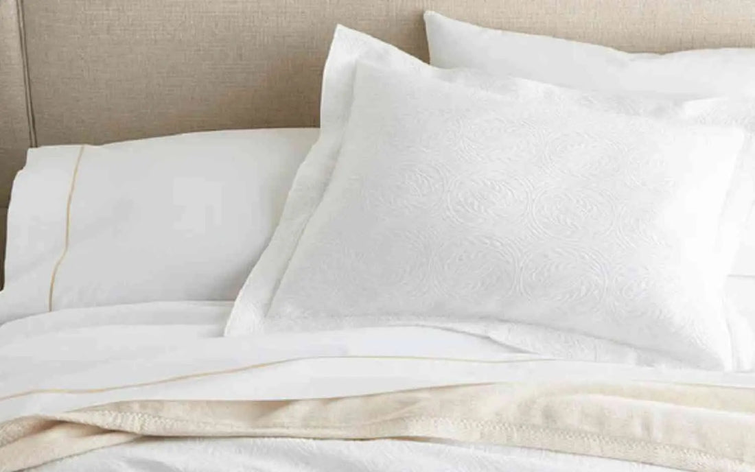 Luxury percale and sateen bedding layered on a styled bed – luxury bedding for better sleep at Shannan Bower Home