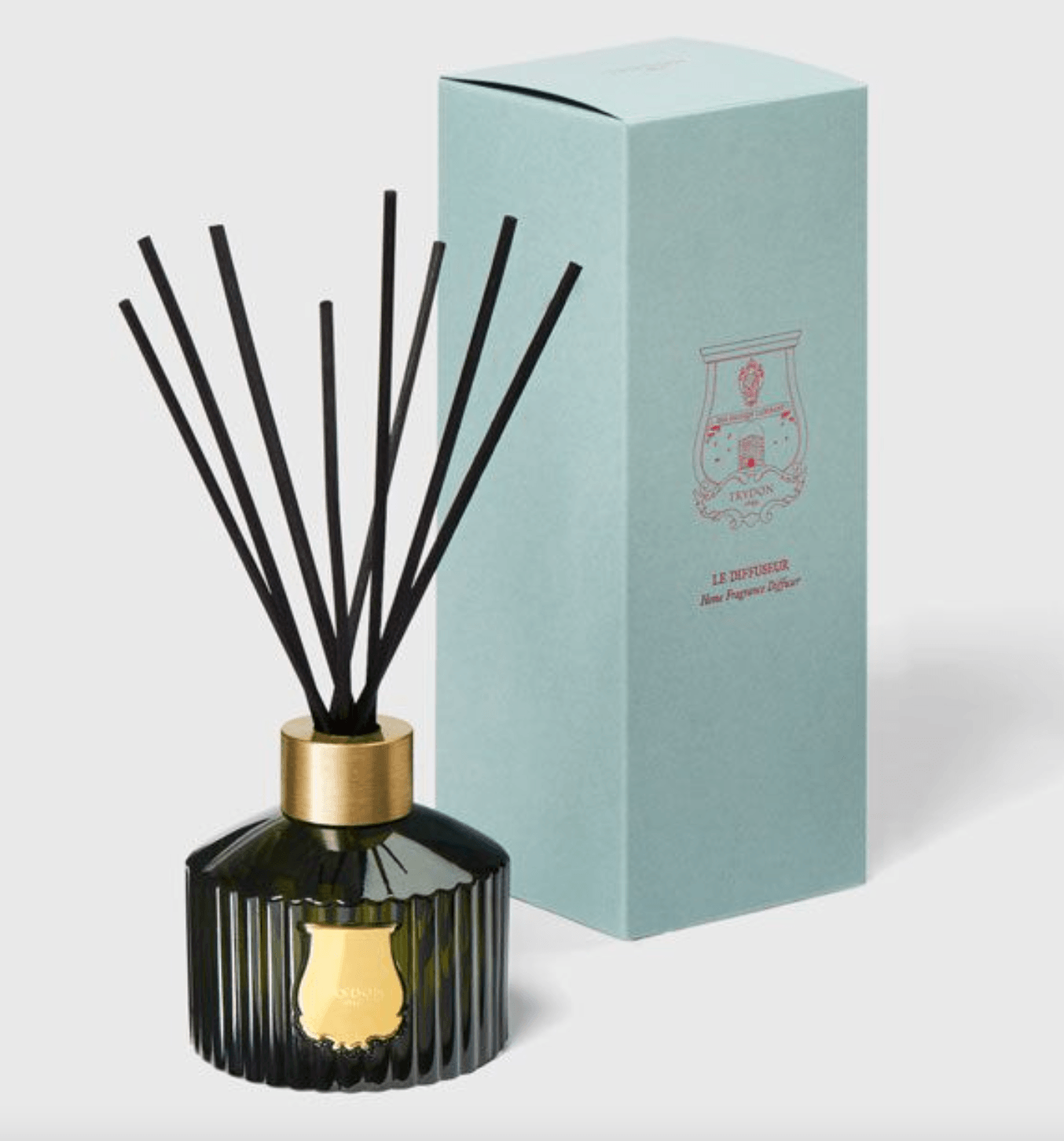Scented diffuser with black reeds and elegant packaging, perfect for housewarming gifts.