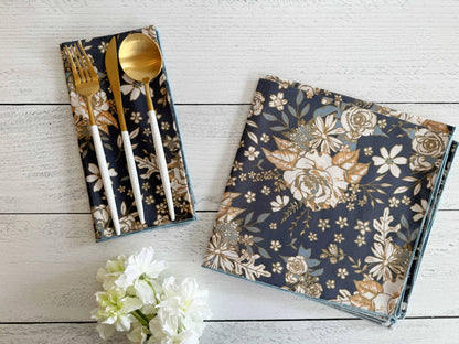 Everyday napkins set, dark navy with gold botanical floral print, neatly folded