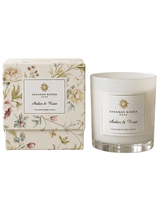 Amber & Rose Candle with floral packaging and Shannan Bower Home label on a white background