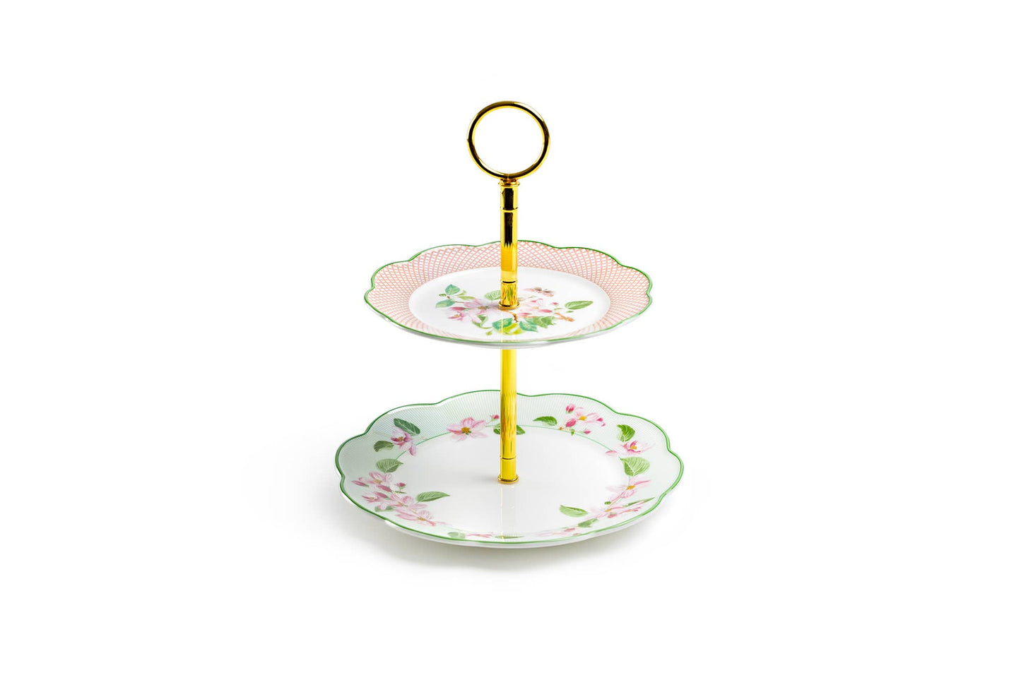Two-tiered ceramic cake stand with floral design on a white background