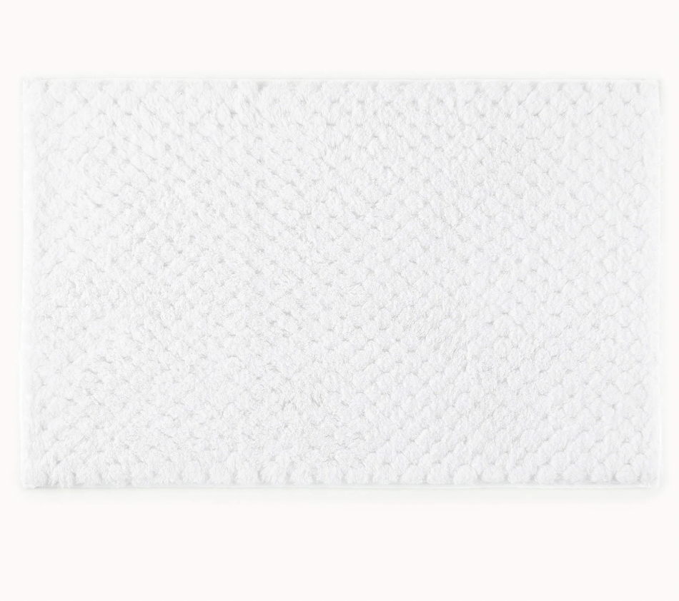 Cotton bath mat product image highlighting color, material, and overall design