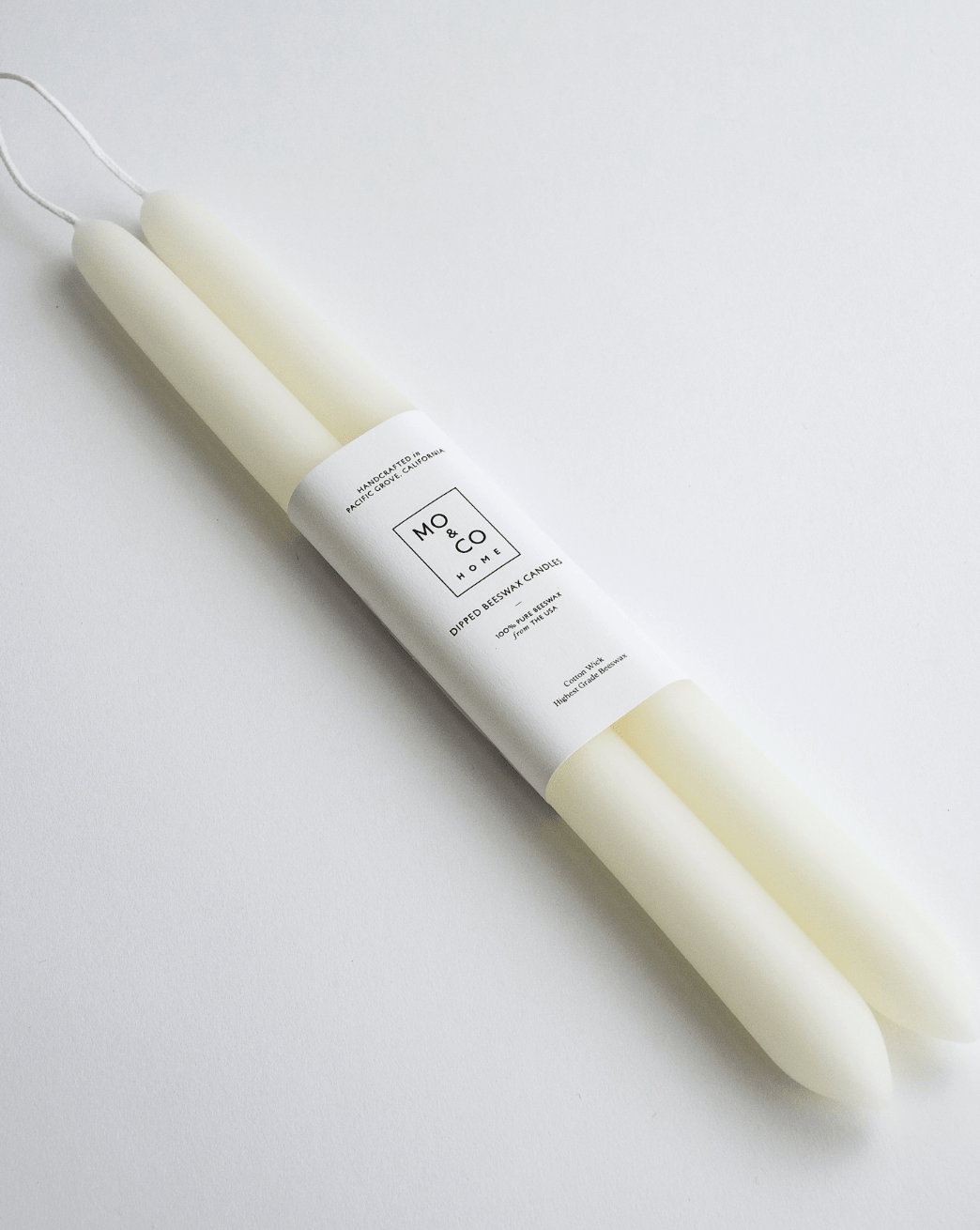 DIPPED BEESWAX TAPER CANDLE 10" product image highlighting color, material, and overall design