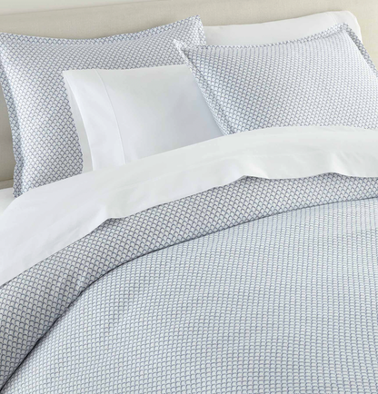 Demi navy duvet cover set in light colorway — crisp white base with classic print