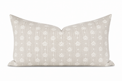 Decorative pillow with floral pattern on a white background