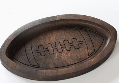 Wooden football catch all tray on a white background