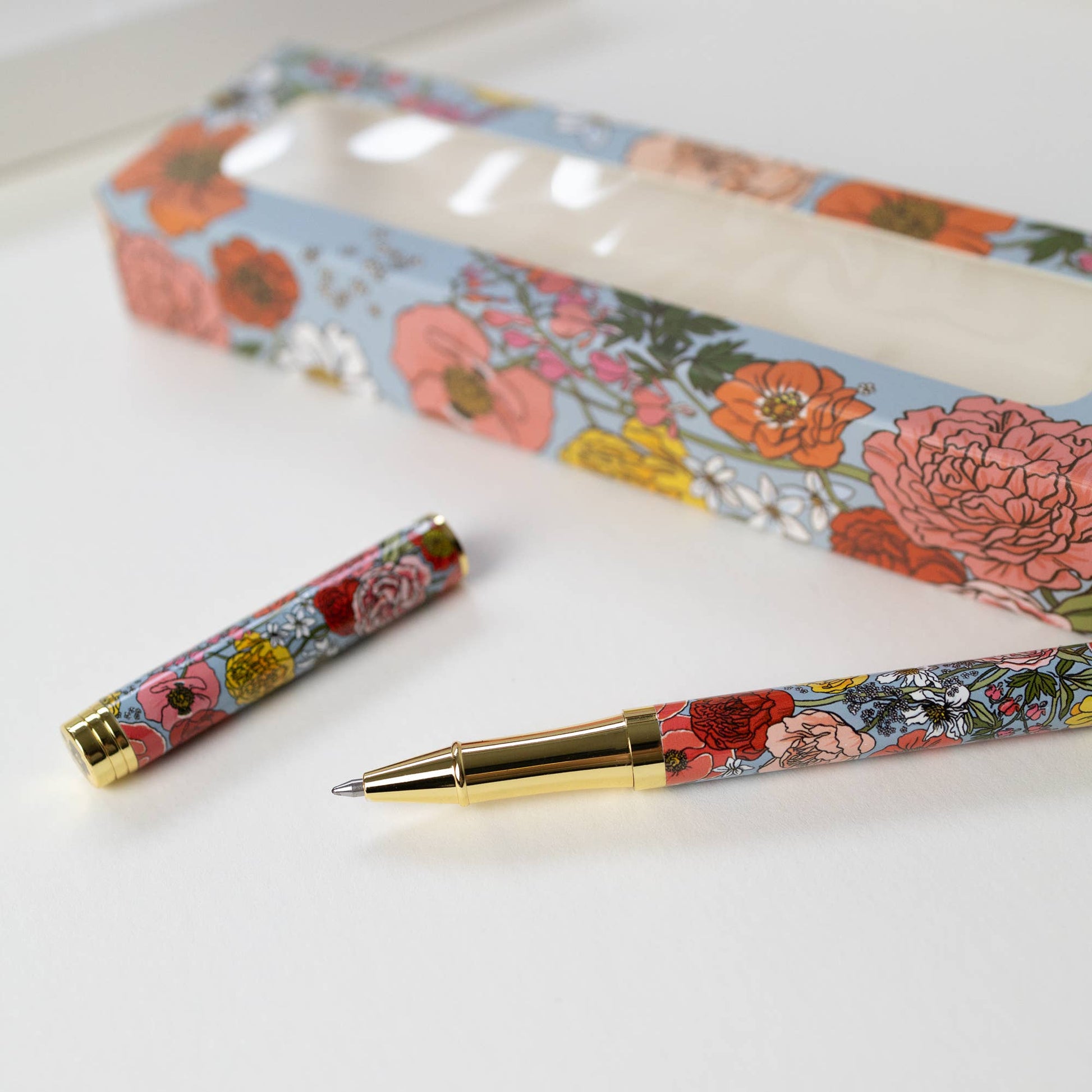GARDEN FLORA | ROLLERBALL PEN -    Product image highlighting color, material, and overall design