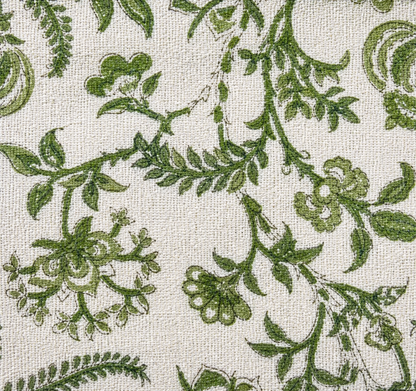 Green floral pattern on a textured beige background
