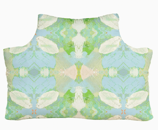 Decorative headboard pillow by Laura Park with a butterfly pattern on a white background