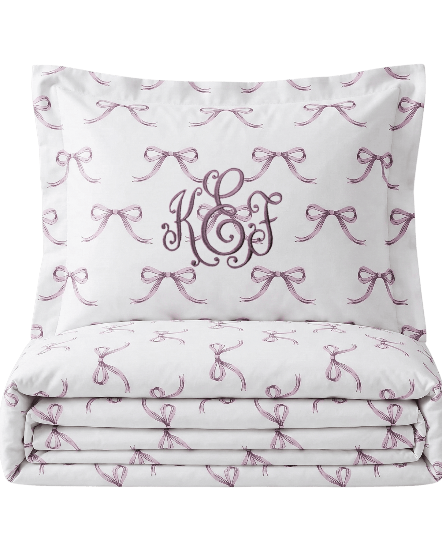 White pillowcase with pink bows and monogram on a white background