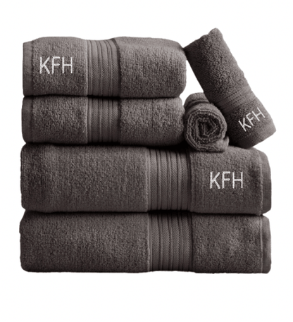 Monogrammed Dorm Bath Bundle. Set of gray towels with 'KFH' monogram on a white background