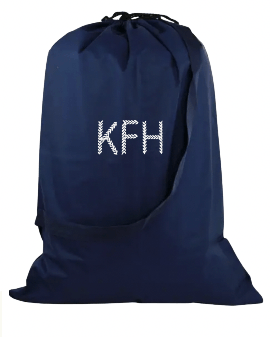 Monogrammed Dorm Bath Bundle. Navy drawstring bag with 'KFH' monogram on a white background