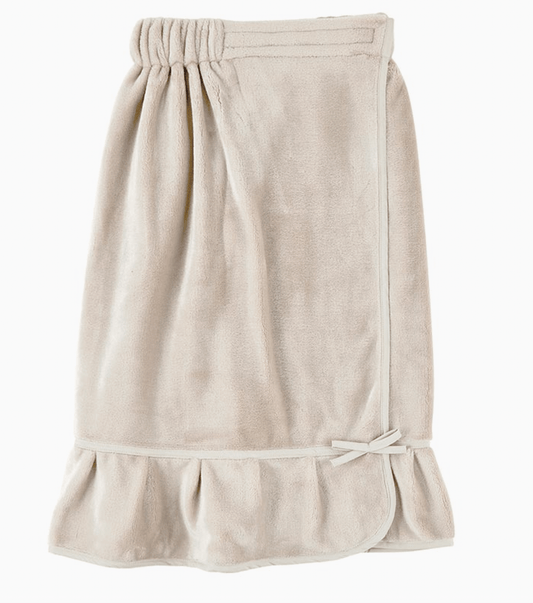 Beige bath spa wrap with a bow on a white background
