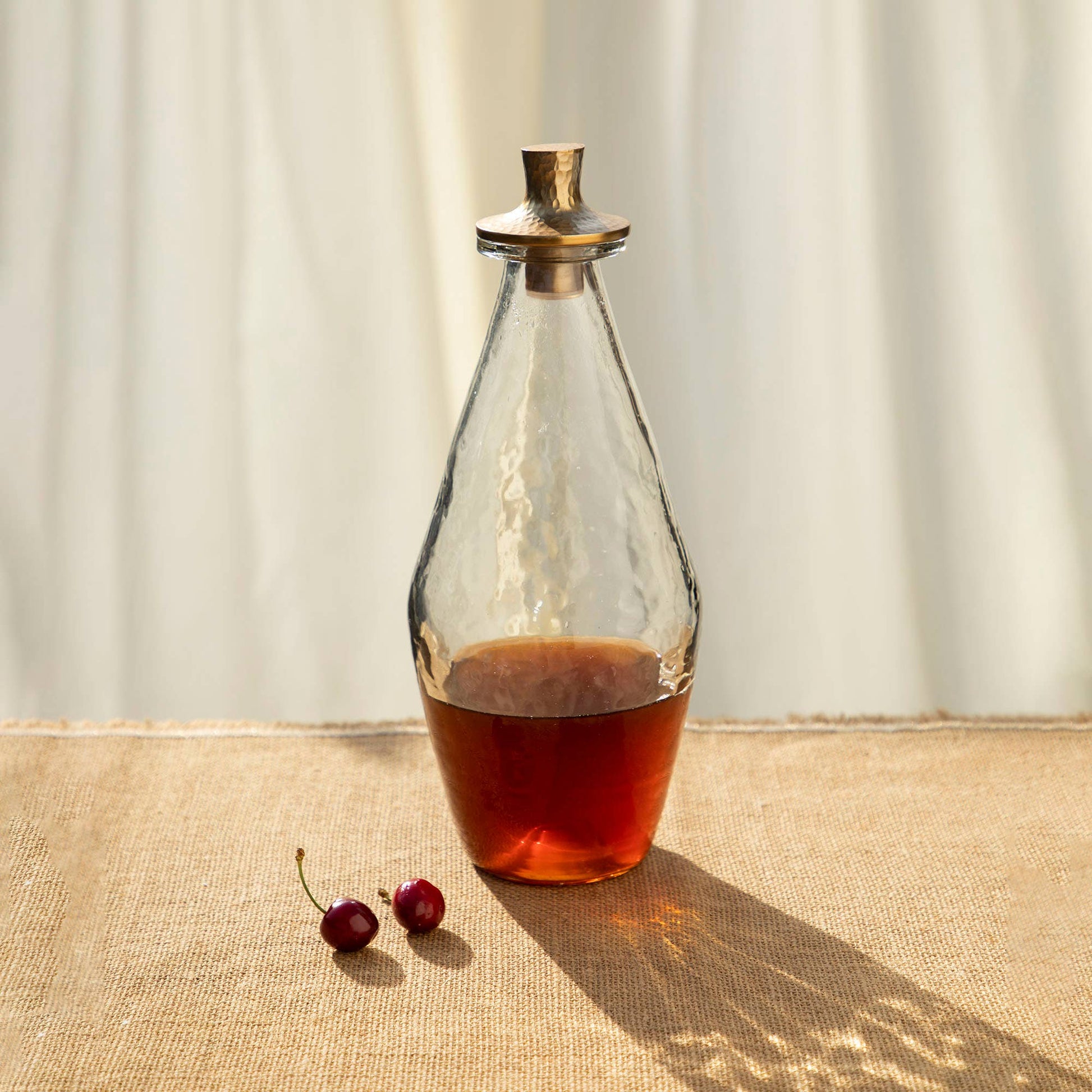 PEBBLED DECANTER  Product image highlighting color, material, and overall design.Shannan Bower Home