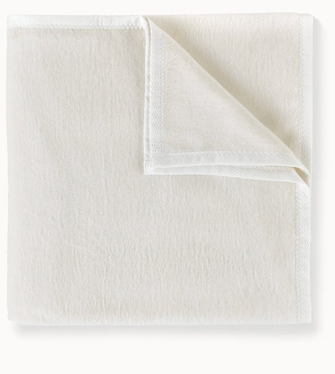 White textured towel on a white background