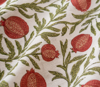 Close up texture shot of the pomegranate red apron.