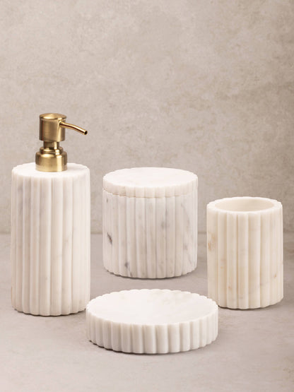 Set of marble-textured bathroom accessories including a soap dispenser, containers, and a lid on a neutral background.