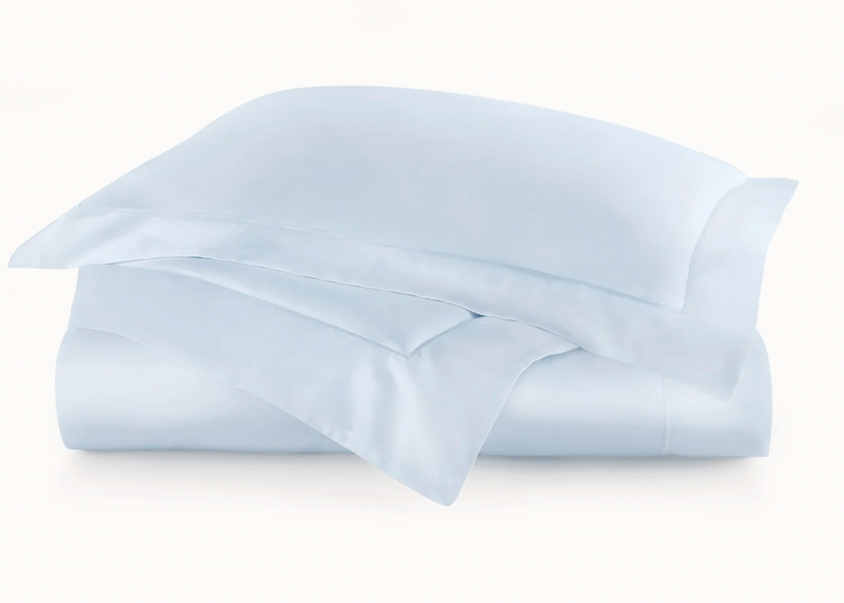 Light blue satin pillowcase on a white background