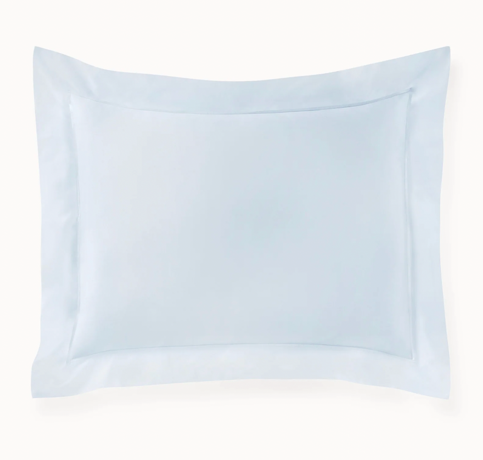 Light blue pillow on a white background