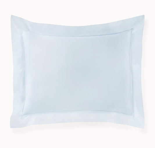 Light blue pillow on a white background