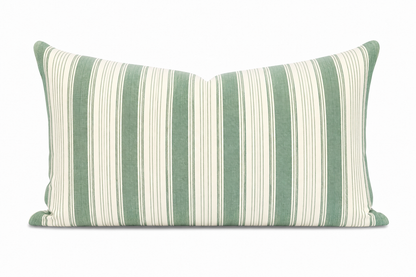 Green and white striped pillow on a white background