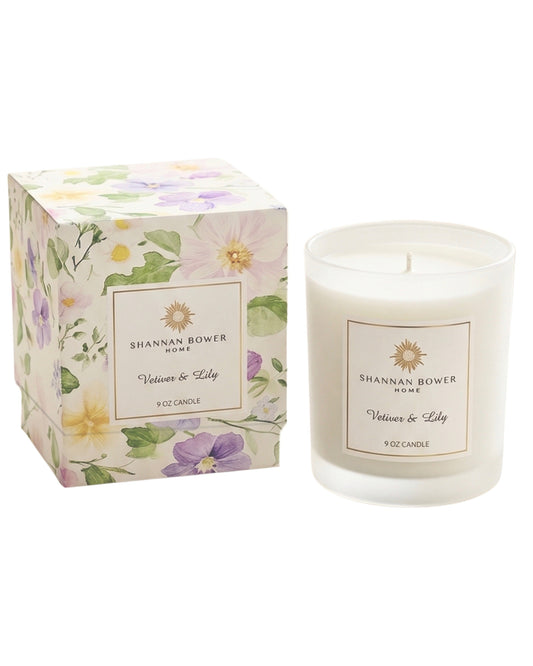 Vetiver & Lily Candle by Shannan Bower Home with floral packaging on a white background