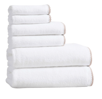 Stack of white towels on a white background
