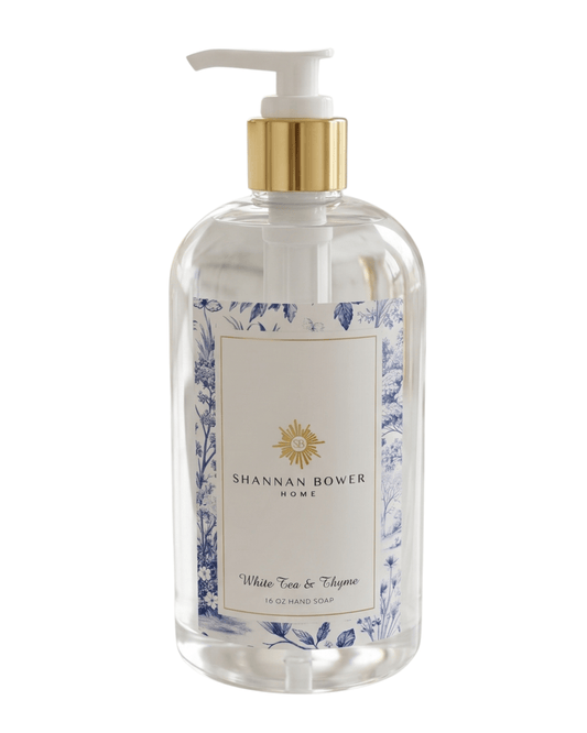 White Tea & Thyme Hand soap bottle with floral design and Shannah Bower branding on a white background