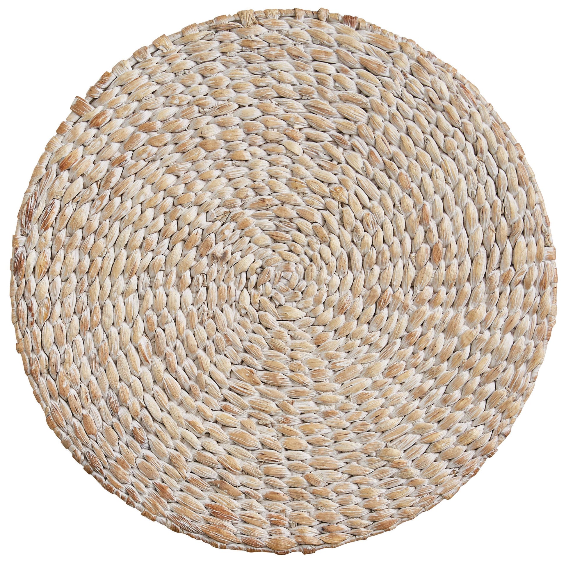 A round placemat made from braided natural water hyacinth.