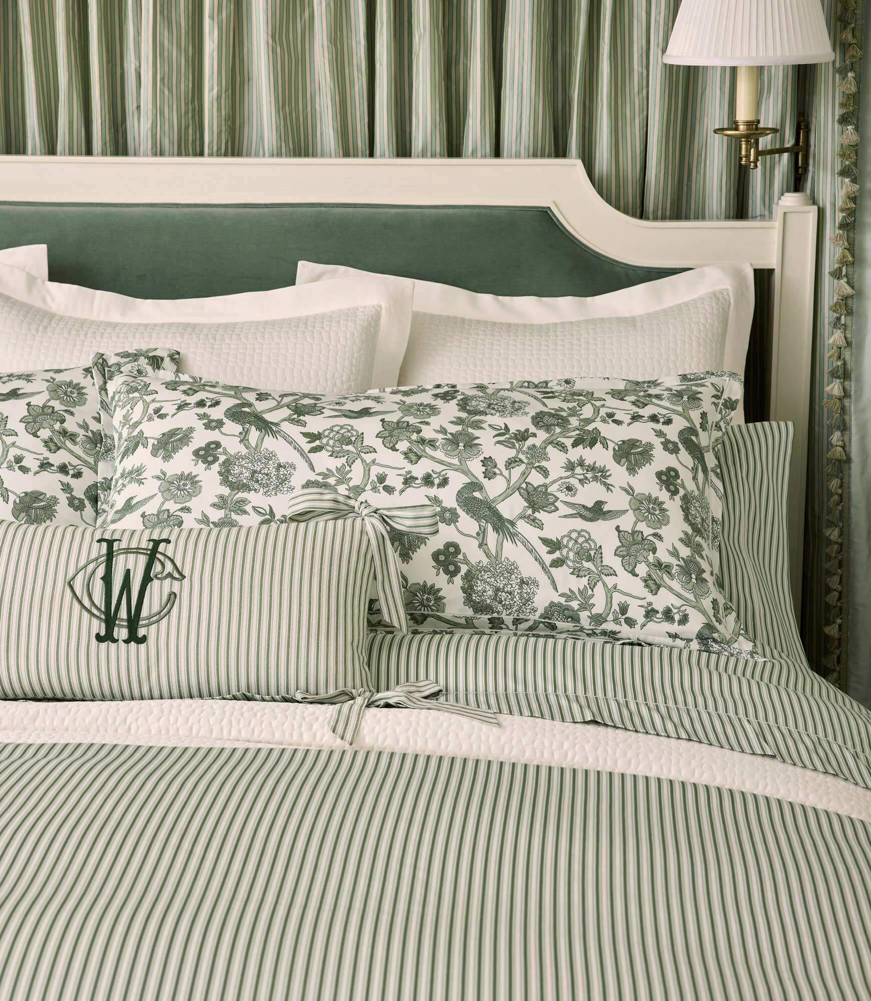 Windsor striped sateen sheet set in Moss and Wedgewood on styled bed