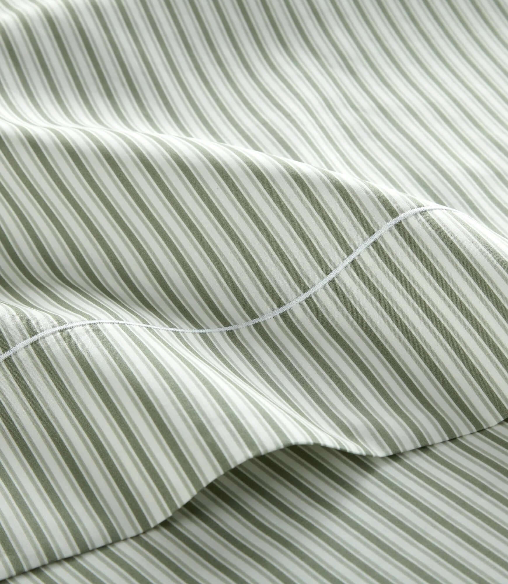 Close-up of Windsor striped sateen sheet set texture and weave