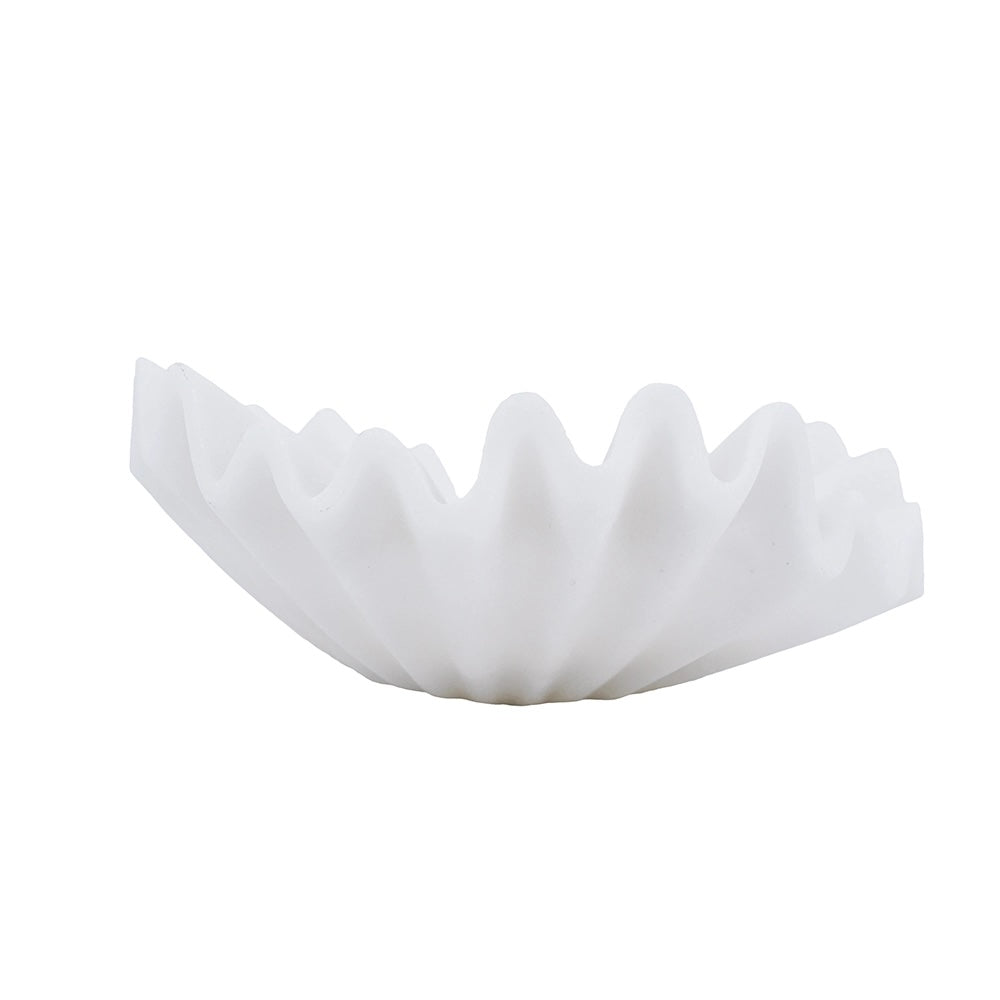 A white, semi-translucent pleated filter disc, commonly used for coffee brewing, shown against a plain white background.