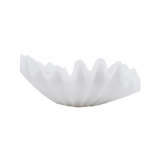 A white, semi-translucent pleated filter disc, commonly used for coffee brewing, shown against a plain white background.